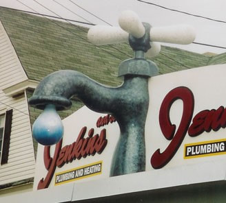 giant faucet prop for exterior plumbing sign, giant custom props